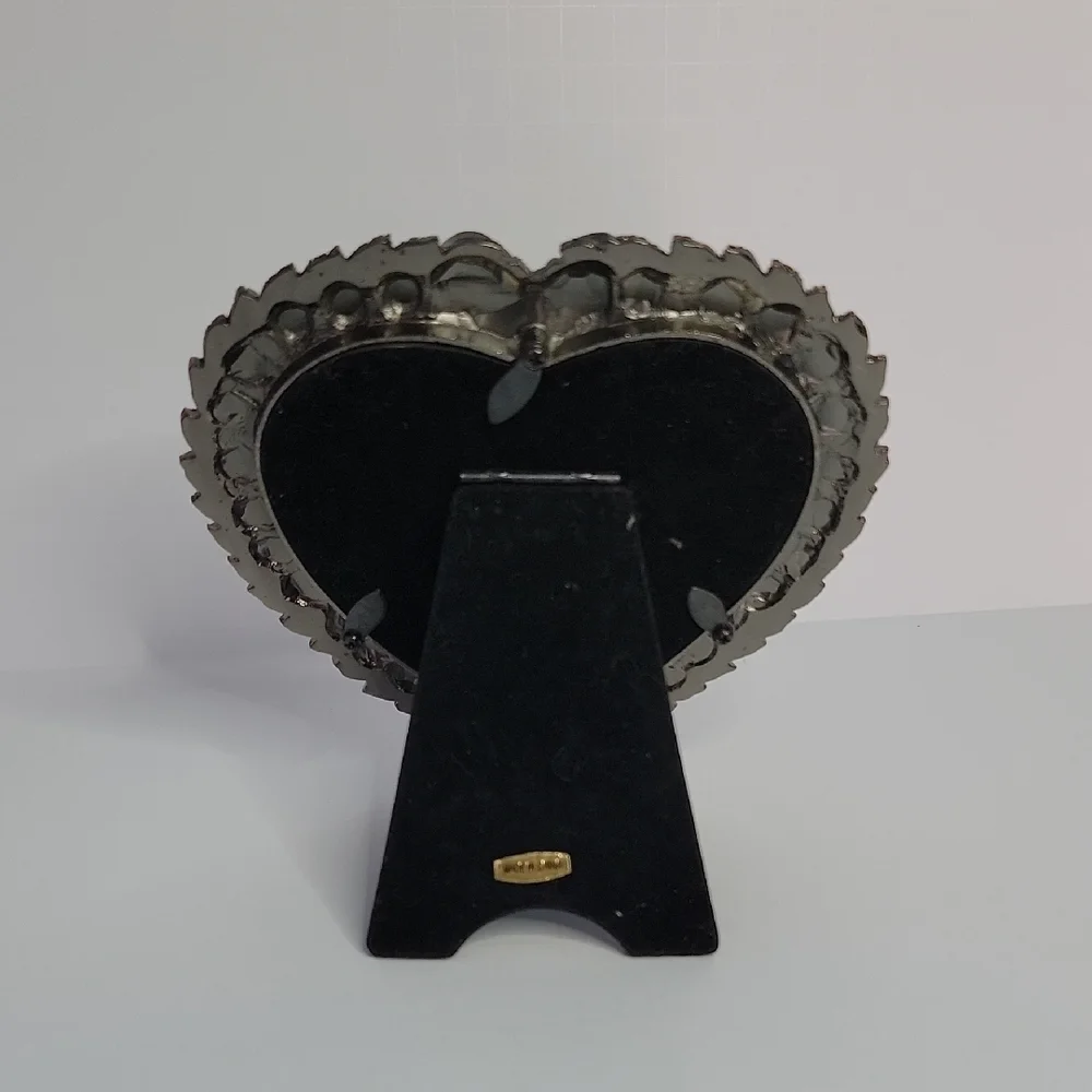 Heart-Shaped Bronze Frame with Red Accents